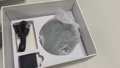 Video qui montre l'ouverture de la boite de la loupe électronique Luna 6 et plus particulièrement le chargeur sans fil